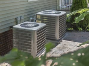 Two central air conditioning units installed at a residence