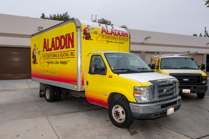 Aladdin AC HVAC work truck parked next to Aladdin AC HVAC work van