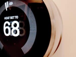A smart thermostat sets the heat at 68 degrees 